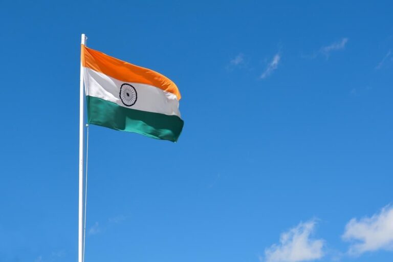 Indian flag against blue sky